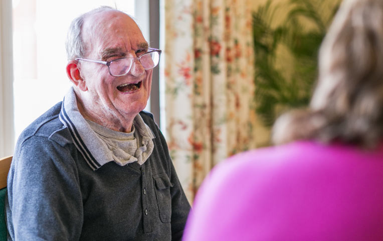 resident laughing at lakeside watermead